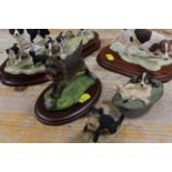 A COLLECTION OF BORDER FINE ARTS AND OTHERS DOG FIGURINES TO INCLUDE SHEEP DOGS AND SPANIELS