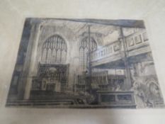 A FRAMED AND GLAZED ENGRAVING OF A CHURCH INTERIOR