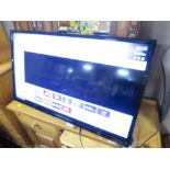 A 31" FLATSCREEN TV - NO REMOTE (NO STAND)