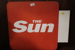 A VINTAGE DOUBLE SIDED METAL SIGN FOR 'THE SUN'