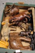 A QUANTITY OF CARVED WOODEN AFRICAN ANIMALS ETC