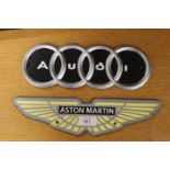 ***AN ASTON MARTIN PLAQUE TOGETHER WITH AN AUDI PLAQUE (2)**