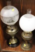 TWO VINTAGE OIL LAMPS WITH GLASS SHADES