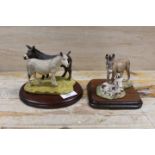 TWO BORDER FINE ARTS STYLE DONKEY FIGURES