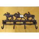 ***A CAST HORSE RACING THEMED COAT RACK **