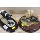 A BORDER FINE ARTS FIGURE OF A COW AND CALF TOGETHER WITH AN AYNSLEY RAM (2)