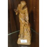 A CARVED WOODEN RELIGIOUS FIGURE OF FRANCIS OF ASSISI