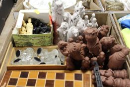 A TRAY OF ASSORTED CHESS PIECES AND CHESS BOARDS