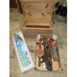 A WOODEN CARPENTERS TOOL BOX WITH VARIOUS WOODWORKING TOOLS AND A TILE CUTTER