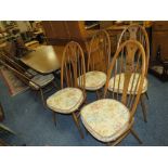 AN ERCOL REFECTORY TABLE AND SIX SWANBACK CHAIRS
