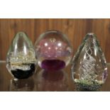 THREE VARIOUS GLASS PAPERWEIGHTS