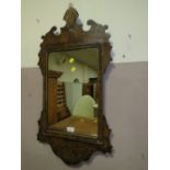 A GEORGIAN STYLE WALL MIRROR