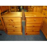 A PAIR OF MODERN HONEY PINE BEDSIDE CHESTS (2)