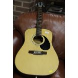 A TANGLEWOOD ACOUSTIC GUITAR