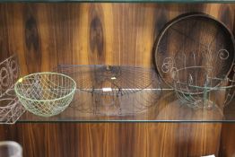 A COLLECTION OF VINTAGE WIREWORK GARDEN PLANTERS ETC TO INCLUDE A RIDDLE, HANGING BASKET ETC