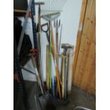 A LARGE SELECTION OF GARDEN TOOLS WITH A SET OF CHIMNEY / DRAIN RODS
