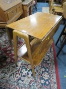 A VINTAGE TEAK TWO TIER TROLLEY