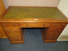 A VICTORIAN MAHOGANY TWIN PEDESTAL DESK WITH GREEN LEATHER TOP W 117 CM