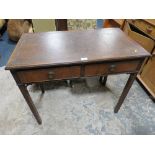 A VINTAGE MAHOGANY TWO DRAWER SIDE TABLE WITH LEATHER TOP