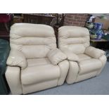 A PAIR OF MODERN CREAM LEATHER ARMCHAIRS