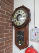 A VINTAGE REGULATOR WALL CLOCK