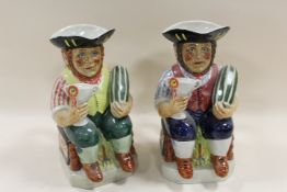 TWO KEVIN FRANCIS TOBY JUGS 'THE GARDENER' IN TWO DIFFERENT COLOURWAYS