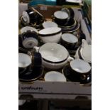 A TRAY OF ASSORTED BLUE AND GILT CHINA WARE TO INCLUDE ROMANOV ROYAL WORCESTER COALPORT ETC