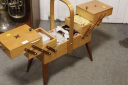 A RETRO STYLE SEWING BOX AND CONTENTS