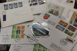 FIVE ALBUMS OF FIRST DAY COVERS AND ROYAL FAMILY PHOTOGRAPHS