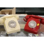 A VINTAGE RED TELEPHONE TOGETHER WITH A CREAM EXAMPLE (2)