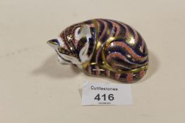 A ROYAL CROWN DERBY PAPERWEIGHT FIGURE OF A CAT WITH SILVER STOPPER