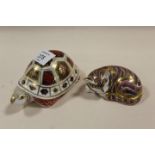TWO ROYAL CROWN DERBY PAPERWEIGHTS - TORTOISE AND A SLEEPING , BOTH WITH SILVER STOPPERS