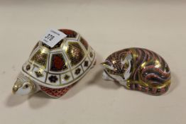 TWO ROYAL CROWN DERBY PAPERWEIGHTS - TORTOISE AND A SLEEPING , BOTH WITH SILVER STOPPERS