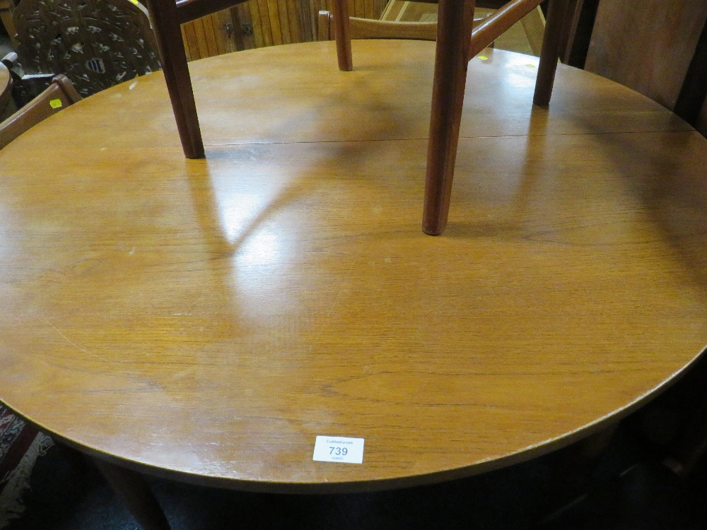 A VINTAGE TEAK EXTENDING DINING TABLE AND FOUR CHAIRS - Image 2 of 2