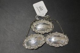 THREE HALLMARKED SILVER DECANTER LABELS - WHISKY , GIN AND SHERRY (3)