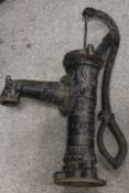 A DECORATIVE CAST METAL STYLE HAND-WATER PUMP