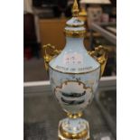 A LIMITED EDITION LIDDED TWIN HANDLED RAF COMMEMORATIVE GILT FINISH VASE BY MALCOLM BARNETT NUMBER