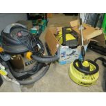 A KARCHER 520M PRESSURE WASHER WITH EXTRA PATIO LANCE AND A TITAN TTB430 VACUUM CLEANER