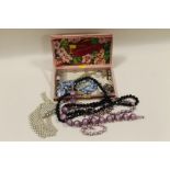A SMALL BOX OF ASSORTED COSTUME JEWELLERY