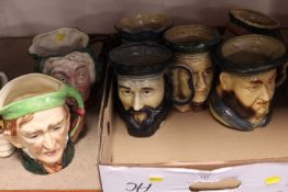 A TRAY OF CHARACTER JUGS