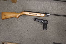 A VINTAGE WEST LAKE CHINESE .22 AIR RIFLE TOGETHER WITH A TAURUS POINT NINE PB GUN (2)