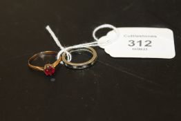A YELLOW METAL DRESS RING STAMPED 585 TOGETHER WITH AN UNMARKED ETERNITY RING (2)