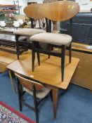 A VINTAGE TEAK EXTENDING TABLE AND FOUR CHAIRS A/F