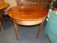 A GEORGIAN MAHOGANY FOLD-OVER TEA TABLE