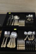 TWO CASES OF SILVER PLATE GILT CUTLERY SETS