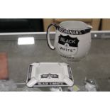 A VINTAGE BLACK AND WHITE WHISKY SHIELD JUG AND MATCHING ASHTRAY