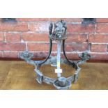 AN UNUSUAL MEDIEVAL STYLE THREE BRANCH LIGHT FITTING
