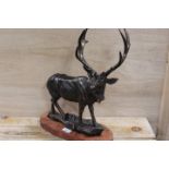 ***A CAST FIGURE OF A STAG ON A WOODEN BASE**