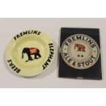 A FREMLINS ELEPHANT BEERS ASHTRAY TOGETHER WITH A SIMILAR BEER MAT IN CLIP FRAME (2)