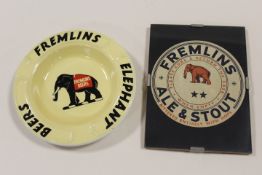 A FREMLINS ELEPHANT BEERS ASHTRAY TOGETHER WITH A SIMILAR BEER MAT IN CLIP FRAME (2)